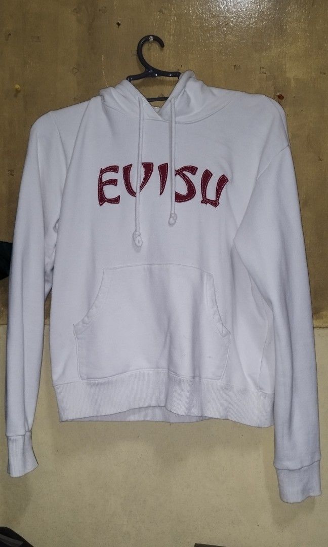 Evisu White Cropped Pullover Hoodie (Category: Coats, Jackets and Outerwear) located in Baguio. Submitted by alu22 (Listing ID 1467885444, Image 1). Description: Evisu White Cropped Pullover Hoodie Good as New Pit to pit: 21in Length: 22in 📍Baguio Loc.