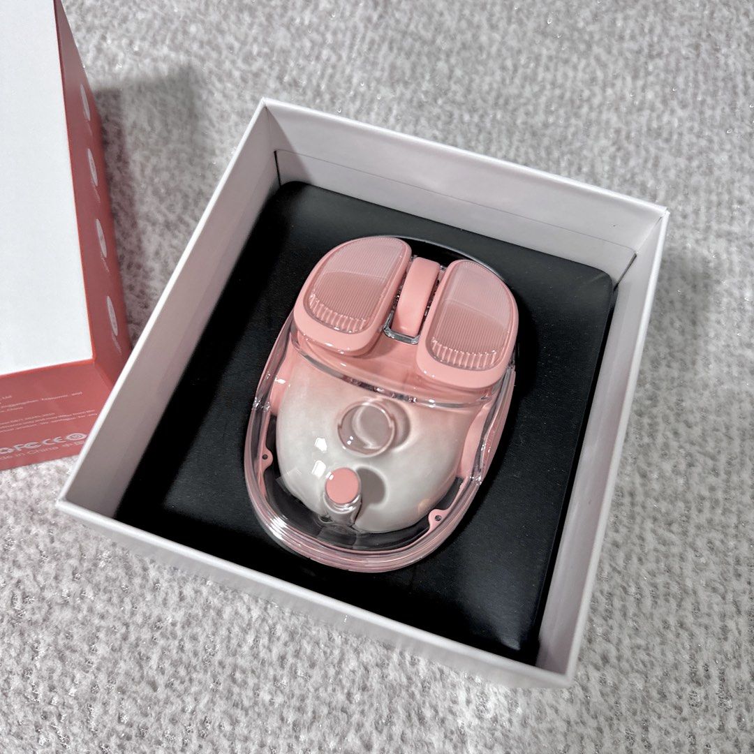 EWEADN Q9 Wireless Bluetooth Mouse Peach (Category: Mouse & Mousepads) located in Paranaque City. Submitted by hershey_august (Listing ID 1467901412, Image 1). Description: - Model: EWEADN Q9 Wireless Bluetooth Mouse - Color: Aesthetic Pink & White - Design: Trendy transparent shell with textured buttons and scroll wheel - Features: Bottom power switch, DPI adjustment button, and smooth blue gliding pads - Inclusion: Comes with original retail bo