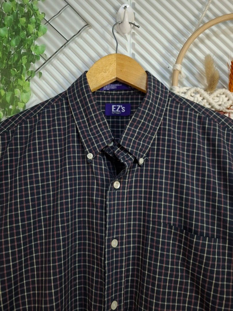 EZ's Plaid Button-Down Shirt (Category: Sets & Coordinates) located in Bulacan. Submitted by cathycampo51092 (Listing ID 1467841871, Image 1). Description: EZ's button-down long sleeve shirt, black base with plaid pattern. Collared neck with front button closure and chest pocket. Chest width measures 23 inches, length is 30 inches, fits large to extra large. Clean condition..