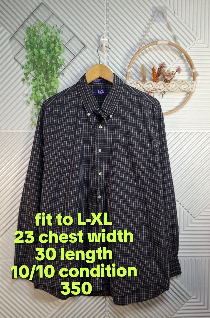 EZ's Plaid Button-Down Shirt (Category: Sets & Coordinates) located in Bulacan. Submitted by cathycampo51092 (Listing ID 1467841871, Image 2). Description: EZ's button-down long sleeve shirt, black base with plaid pattern. Collared neck with front button closure and chest pocket. Chest width measures 23 inches, length is 30 inches, fits large to extra large. Clean condition..
