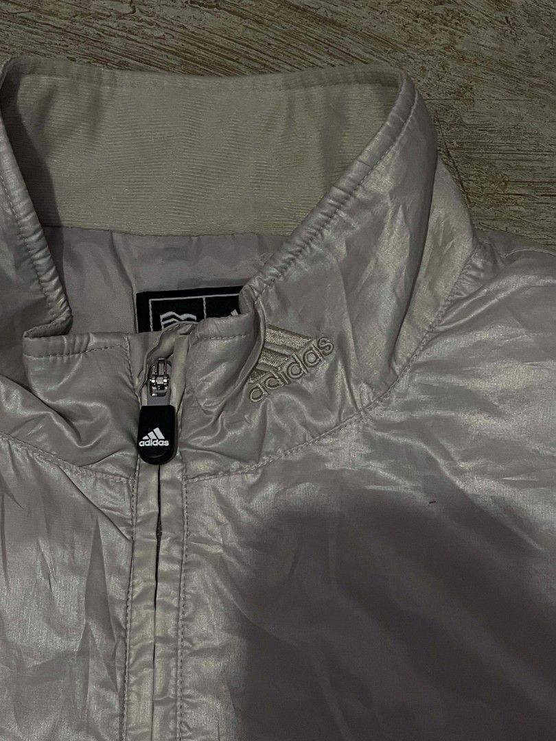 F50 Metallic Track Jacket in Silver Metallic (Category: Coats, Jackets and Outerwear) located in Manila. Submitted by christian.cantar_177 (Listing ID 1467985241, Image 2). Description: Condition: 10/10 Color rate: 10/10 No issue Complete tags 23x26.