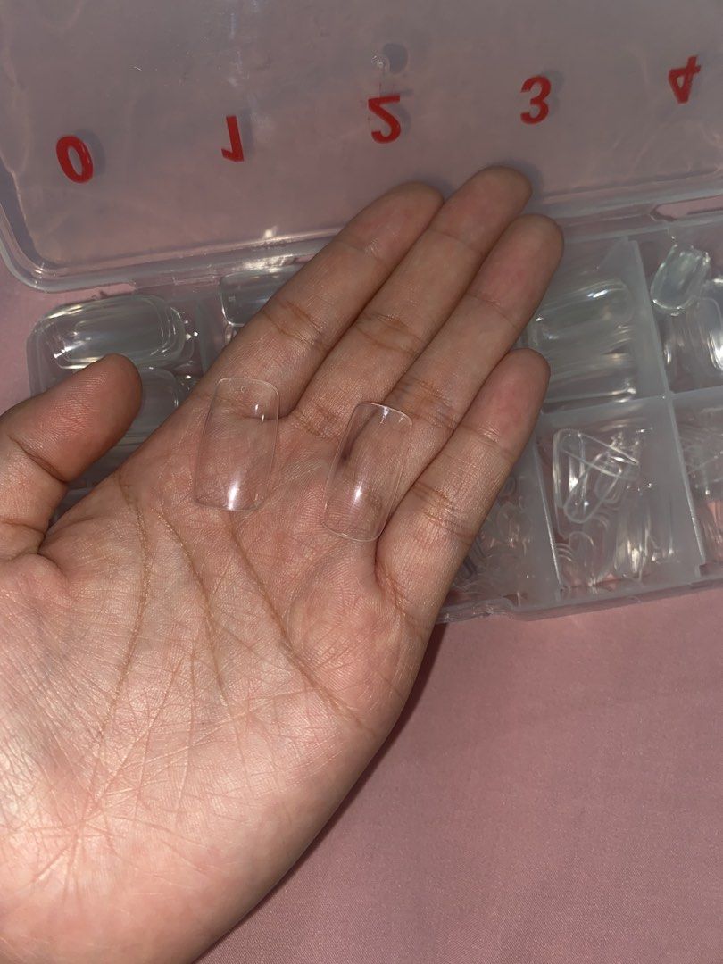 Fake Nails Transparent (Category: Hands & Nails) located in Quezon City. Submitted by camille_kaye (Listing ID 1467868512, Image 3). Description: Probably 450pcs of transparent long nails Used a couple times RFS: Decluttering MOP: Gcash, Maya, MariBank, BDO (payment first).