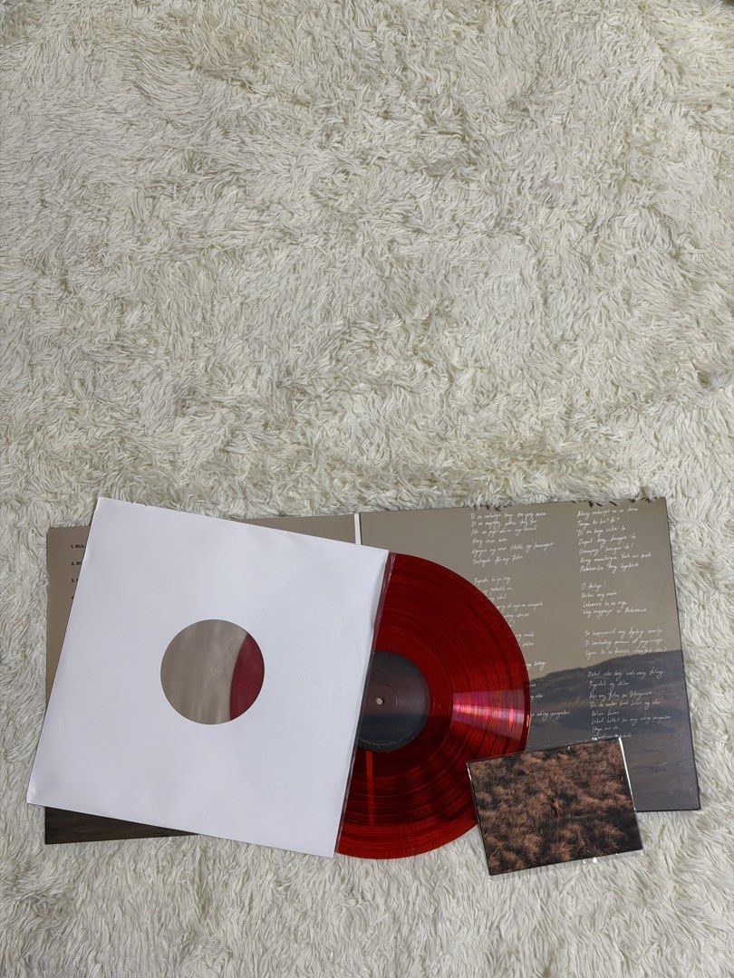 Felip Monarch Vinyl Record LP Translucent Red (Category: Vinyls) located in Manila. Submitted by strbrrictoria (Listing ID 1467914582, Image 2). Description: - Artist/Album: Felip Monarch - Format: Translucent Red LP Vinyl - Inclusions: Printed gatefold jacket, inner paper sleeve, lyric insert sheet, and mini photo print - Condition: Displayed carefully with minimal handling - Perfect addition to any OPM physical music collection.
