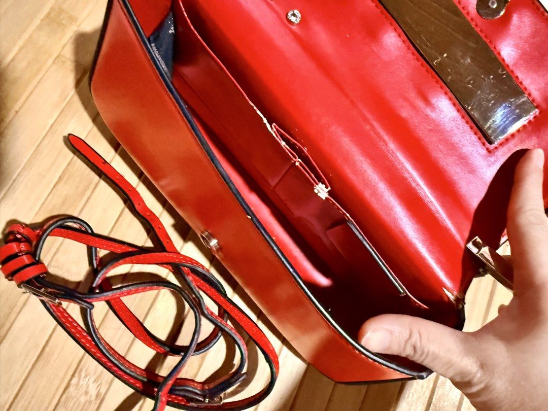 FENDI First Small (Red Nappa Leather) (Category: Shoulder Bags) located in Caloocan City. Submitted by shnicky101 (Listing ID 1467808587, Image 3). Description: FENDI First Small (Red Nappa Leather) Details & Condition: Tilted metal ‘F’ clasp clutch with detachable shoulder strap. Exterior leather and frame in great shape; Minor peeling inside interior lining. Gifted item (no receipt) Received as gifts; original receipts are not available. Detail