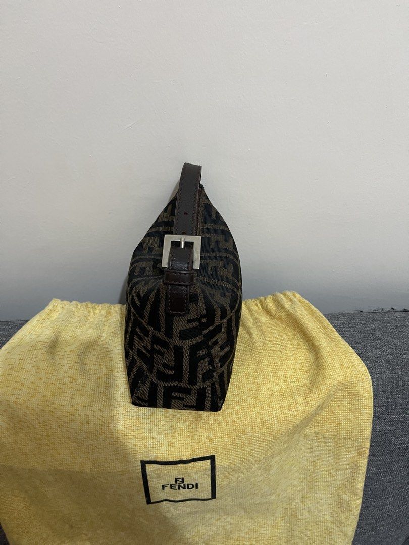 Fendi Zucca Canvas Mini Pochette Handbag (Category: Shoulder Bags) located in Quezon City. Submitted by houseoftrends_ (Listing ID 1467966677, Image 3). Description: - Authentic Classic Fendi Mini Pouch Bag - Brown and black iconic monogram canvas with sturdy structure - Dark brown leather top handle featuring silver-tone buckle hardware - Secure top zip closure - Compact and clean, ideal for carrying everyday essentials - Includes original yello