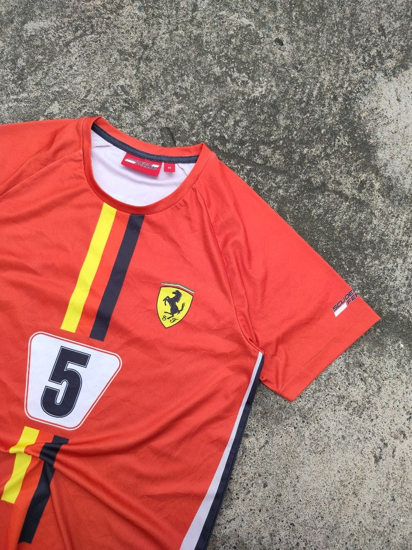 Ferrari Jersey (Category: Activewear) located in Midsayap. Submitted by rogeandrei29987 (Listing ID 1468030721, Image 1). Description: 📌Ferrari Jersey •M on tag •19x27.5 •10/10 cr •No issue/As New MOP: Gcash Courier✈️: Flash Express Unli vouch/Vc with item Loc: Parang, Maguindanao❤️.