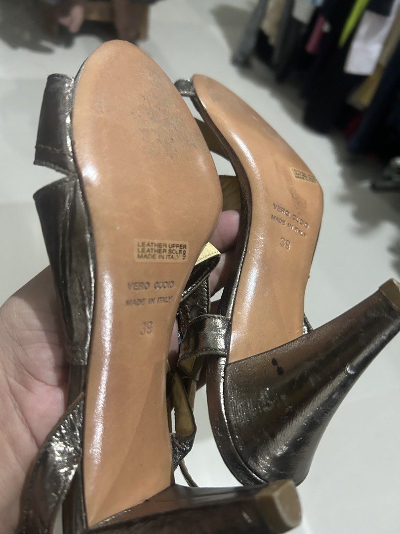 FILIPPO RAPHAEL made in italy 39 (Category: Flats & Sandals) located in Cavite. Submitted by cecitrifthshop (Listing ID 1467932673, Image 3). Description: The image shows a pair of metallic silver strappy high-heel sandals branded with "FILIPPO RAPHAEL SHOES" on the insole.size 39 made in italy .