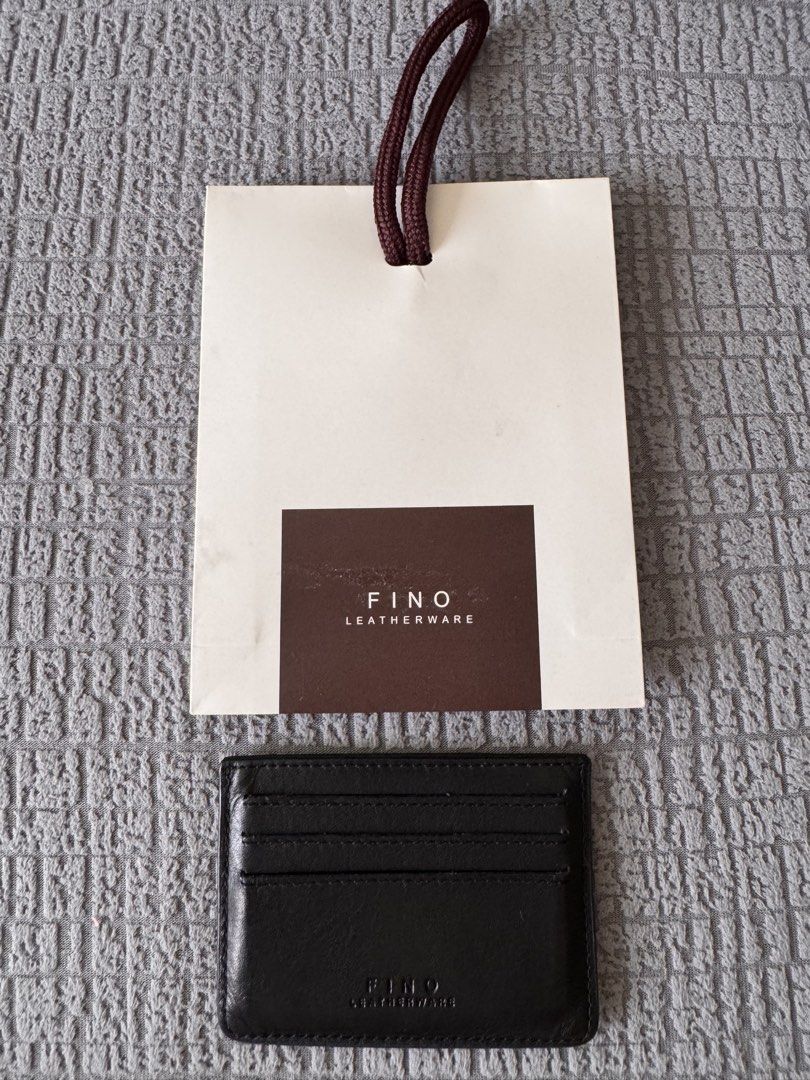 Fino Leather Card Holder Unisex (Category: Wallets & Card holders) located in Mandaluyong City. Submitted by axos723 (Listing ID 1468012698, Image 1). Description: ➡️Please read item description carefully below (click read more 👇) ➡️Personal Preloved ➡️Item is AVAILABLE ➡️1-Day Reservation only ➡️First to pay gets the item ➡️For SURE BUYERS only please. -Price: P350+ SF -Brand: Fino Leatherware -Color: Black -Condition: Lightly Used. There are s