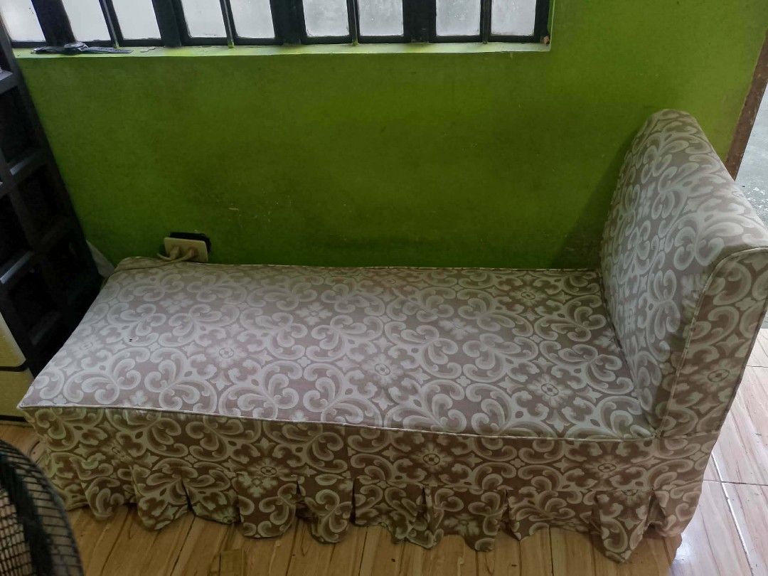 Floral pattern daybed sofa with matching footstool (Category: Sofas) located in Quezon City. Submitted by madelrivera (Listing ID 1468003248, Image 3). Description: - Brown fabric long sofa daybed featuring a chic floral vine pattern - High backrest on one end for comfortable lounging - Includes a matching separate footstool that slots right in or works standalone - Excellent space-saving design for living rooms or bedroom corners - Sturdy solid 