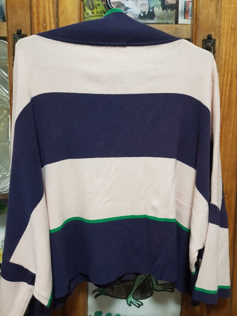 For Me Striped Collared Knit Crop Top (Category: Longsleeves) located in Baguio. Submitted by soonshimcart (Listing ID 1467854377, Image 3). Description: Forme collared sweater in a striped navy, pink, and green colorway. Made from knit fabric with long sleeves. Size USA XL, EUR 42, UK 14 tag inside. Includes collar neckline. Note: has some small reddish discoloration stains on the lower navy stripe near the hem as pictured..