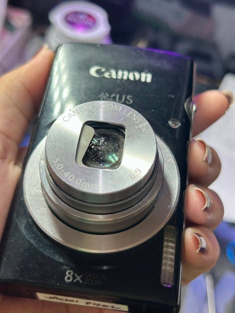 [For Repairs] Canon Ixus 185 (Category: Cameras) located in Quezon City. Submitted by kuromist (Listing ID 1467875567, Image 1). Description: Still working but with major issues, no battery included but can send test video since I’m also using the battery for a different camera. SLIGHTLY NEGO. Issues: - Lens cover does not full close/open - Scratches on the lens, affects output - Rubber cover is damaged - Lots of scratches na MOP: Gcash/Maya/GoTy
