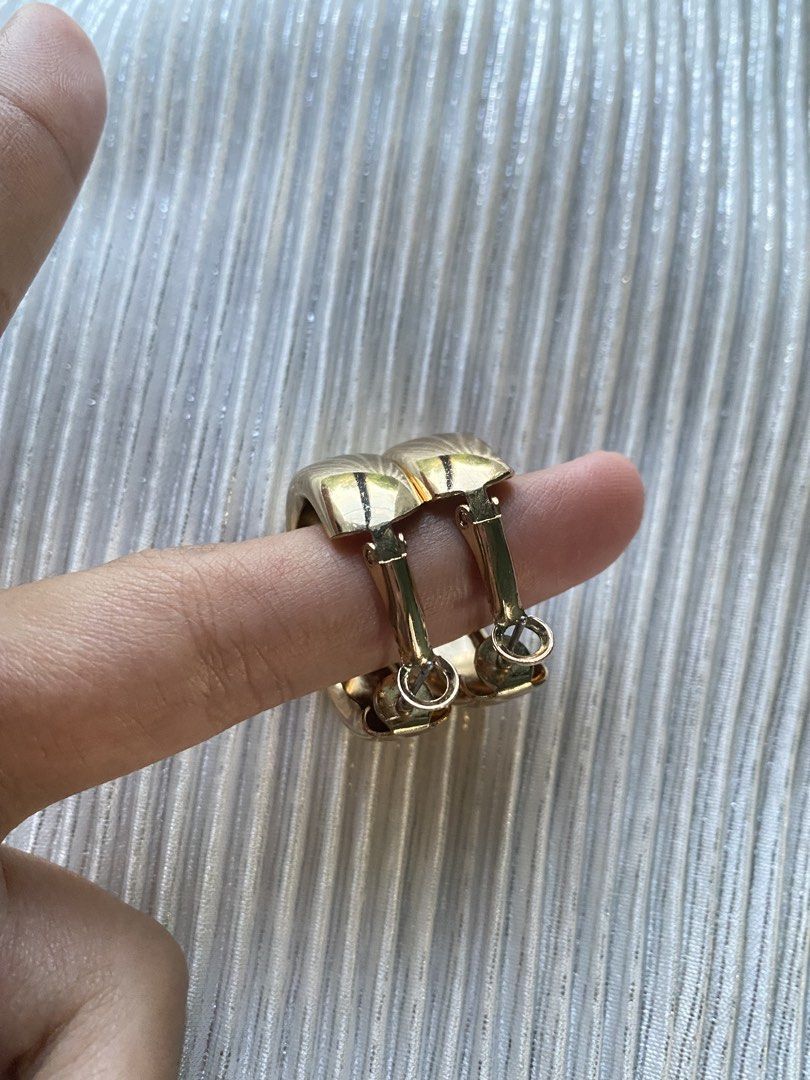 Forever21 Chunky Gold Hoop Earrings (Category: Earrings) located in Tabaco. Submitted by camila_p (Listing ID 1468055955, Image 2). Description: - Thick gold-tone hoop earrings with a polished, shiny finish - Classic dome shape with a versatile medium width - Standard post back closure with a secure clasp - Lightweight design ensures comfort for all-day wear - A must-have everyday staple to instantly dress up any outfit.