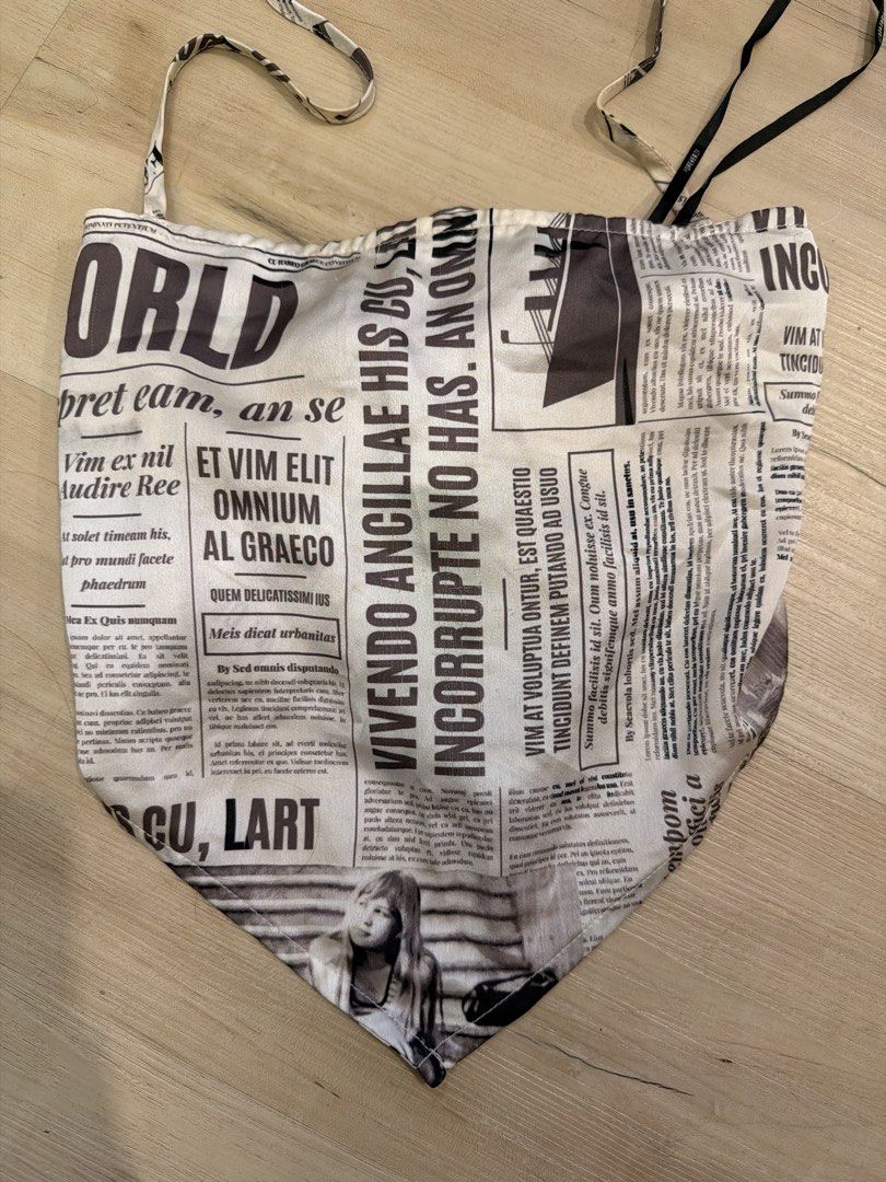 Forever 21 Newspaper Print Halter Top (Category: Sleeveless) located in Manila. Submitted by _____car0usell (Listing ID 1467959941, Image 2). Description: can be tied to ur size, adjustable.