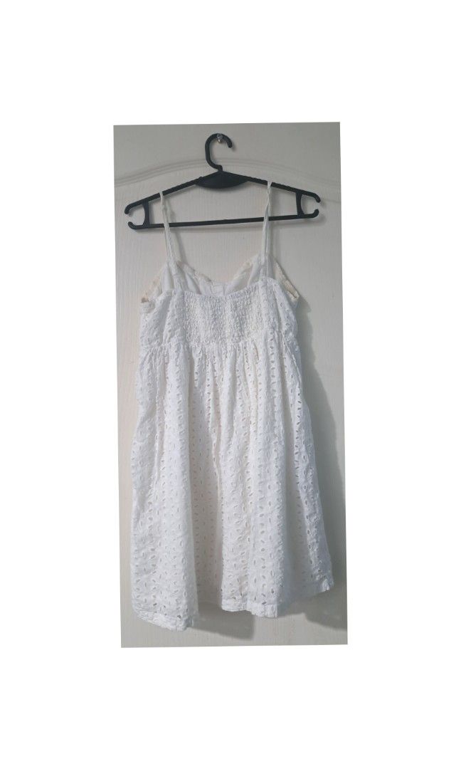 Forever 21 White Eyelet Dress (Category: Dresses) located in Legazpi City. Submitted by alyblueberyl (Listing ID 1467935619, Image 2). Description: Size Small Adjustable strap.
