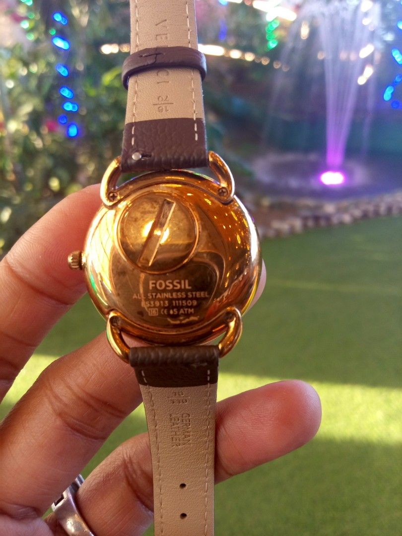 Fossil Brown Leather Strap Gold Tone Wristwatch (Category: Women's Watches) located in Malolos. Submitted by lizarondoe59660 (Listing ID 1467923219, Image 2). Description: - Brand: Fossil - Model: ES3913 - Dial: Textured brown with day and date sub-dials - Case: Rose gold tone with stainless steel back - Strap: Dark brown German leather with buckle closure - Water Resistance: 5 ATM - Condition: Classic everyday timepiece Good condition Replacemen