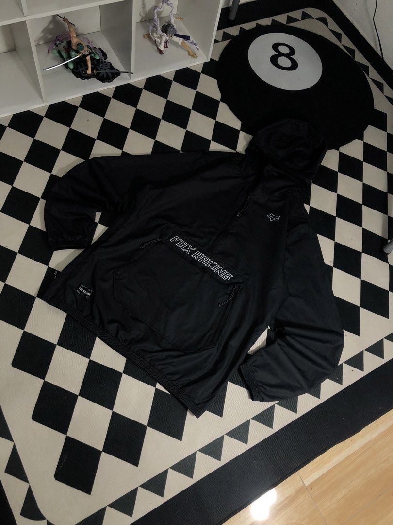 Fox Racing Windbreaker Black Size Medium. Dimes: 22X29.5 (Category: Coats, Jackets and Outerwear) located in Manila. Submitted by ejaay_2012 (Listing ID 1467936502, Image 3). Description: - Brand: Fox Racing - Style: Half-zip anorak windbreaker - Size: Medium - Color: Black with white branding and small Fox head logo - Features: Large front pocket, drawstring hood and hem, inner authenticity tags.