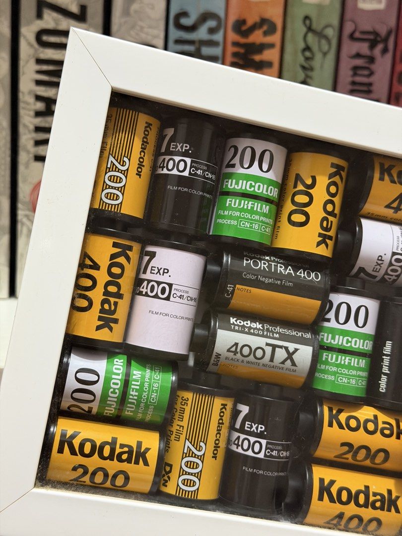 Framed 35mm Film Canisters (Category: Art & Prints) located in Quezon City. Submitted by wordsbymiss.r (Listing ID 1467979980, Image 2). Description: Decluttering ❗️ - handmade, bought from The Film Cartel - recycled 35mm film canisters (Kodak, Fujifilm, Portra, and 400TX) - white shadow box frame with glass front - square in size - sawtooth hanger on the back for wall mounting - for display only 📍 sampaloc, manila 💵 bank transfer/ maribank/ go