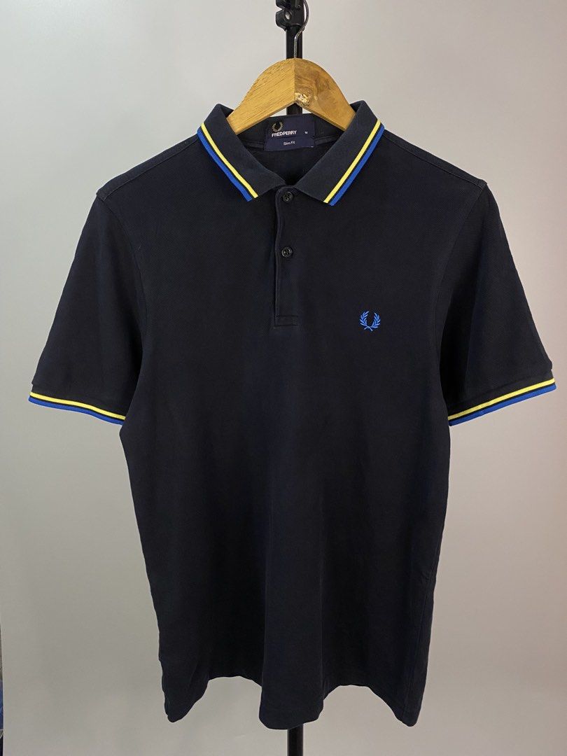 Fred Perry Polo Shirt (Category: Tshirts & Polo Shirts ) located in Bacolod City. Submitted by hayymeeh.finds (Listing ID 1467981441, Image 1). Description: (Authentic) Fred Perry Polo Shirt - Navy Size: Medium Measurements: Width: 19"| Length: 27" Condition: excellent condition, flawless, 9.5/10 color rate Price: ₱1,380 negotiable and free shipping 📍 Location: Bacolod City 🚚 Shipping: (J&T / Meet-up if available) 💳 Payment: (GCash / Cash / Ba