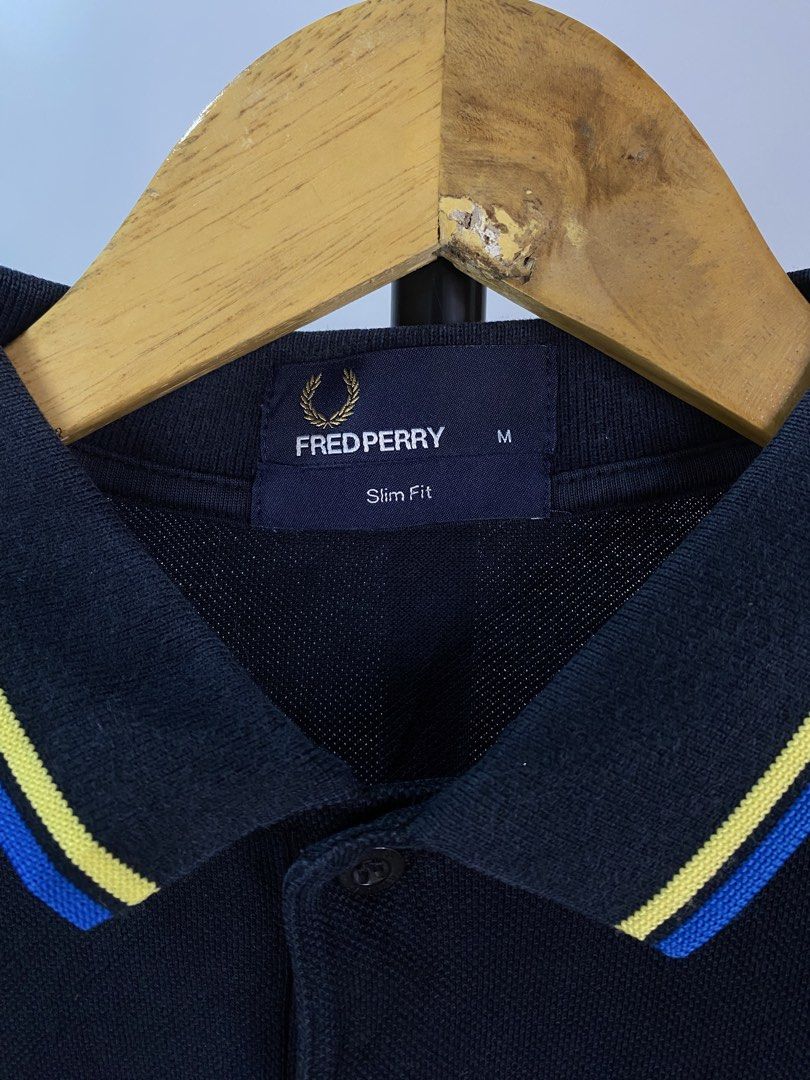 Fred Perry Polo Shirt (Category: Tshirts & Polo Shirts ) located in Bacolod City. Submitted by hayymeeh.finds (Listing ID 1467981441, Image 3). Description: (Authentic) Fred Perry Polo Shirt - Navy Size: Medium Measurements: Width: 19"| Length: 27" Condition: excellent condition, flawless, 9.5/10 color rate Price: ₱1,380 negotiable and free shipping 📍 Location: Bacolod City 🚚 Shipping: (J&T / Meet-up if available) 💳 Payment: (GCash / Cash / Ba