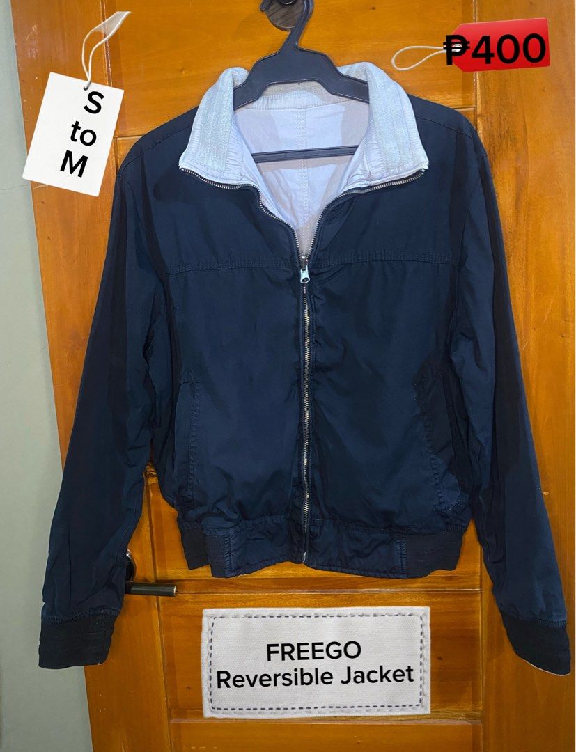 FREEGO Reversible Jacket Size S to M (Category: Coats, Jackets and Outerwear) located in Baguio. Submitted by heath2600 (Listing ID 1468011283, Image 1). Description: - Brand: FREEGO - Style: Reversible jacket - Color: Navy blue (one side) - Size: Fits small to medium frames - Features: Full front zip closure, ribbed cuffs, and hem - Best for: Everyday casual layering.