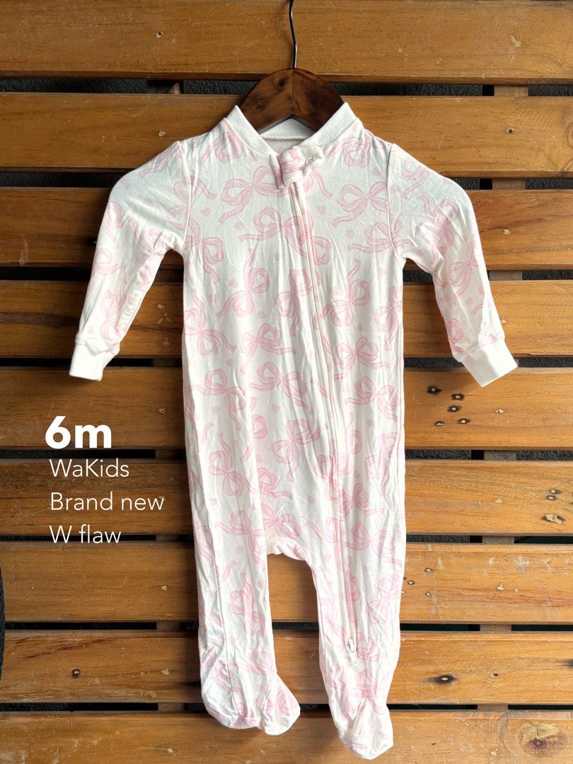 Frogsuits (Category: Babies & Kids Fashion) located in Santa Rosa. Submitted by yasss23 (Listing ID 1467984078, Image 3). Description: - Brand: Little Me - Size: 6 months - Condition: Brand new with tag attached (Never worn) - Color/Design: Light pink with white prints - Features: Full front zip closure with charming ruffle trim, long sleeves, and enclosed feet to keep toes warm - Material: Ultra-soft cotton ₱180 each.