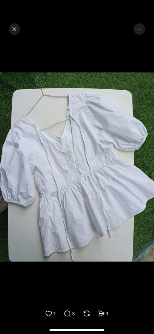 FU Light Blue Tie-Front Puff Sleeve Blouse (Category: Blouses) located in Alaminos. Submitted by amor1986 (Listing ID 1467862100, Image 2). Description: - Color: Light blue - Material: Lightweight, breathable cotton - Design: Short puff sleeves, V-neckline, and front tie closures - Fit: Loose and comfortable - Brand/Tag: Tagged FU at the collar - Styling: Great with denim shorts or skirts for warm days Small to Medium Frame Sinusuot ko nung Bunti