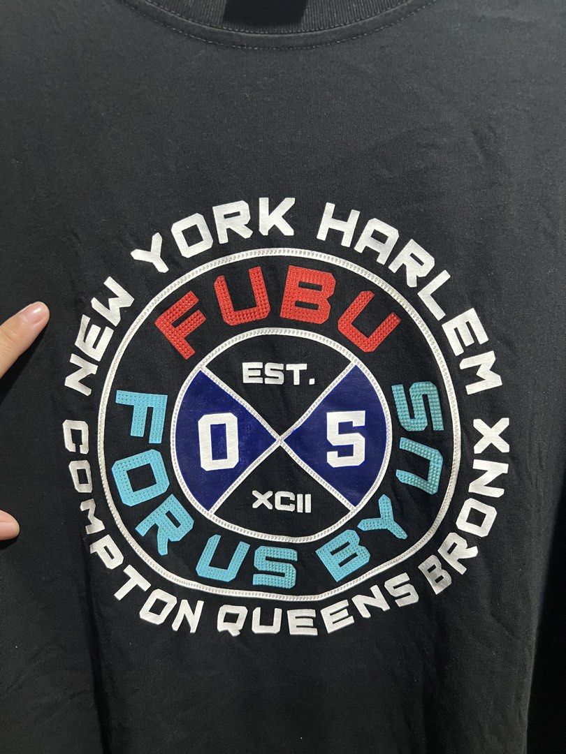 FUBU graphic t-shirt (Category: Activewear) located in Manila. Submitted by jdstrll (Listing ID 1467965107, Image 3). Description: Width: 30 Length: 34 - USED ONCE, good for dancers 🚚Mode of Delivery: J&T/Lalamove/Meet up 🫴🏼 Price Still Negotiable 📦We ship nationwide: Luzon/Visayas/Mindanao 🧾Mode of Payment: Gcash/Landbank/BPI/Gotyme/RCBC ✅ Shipping fee should be shouldered by the buyer. 👕 All items are sanitized feel free to check out my a