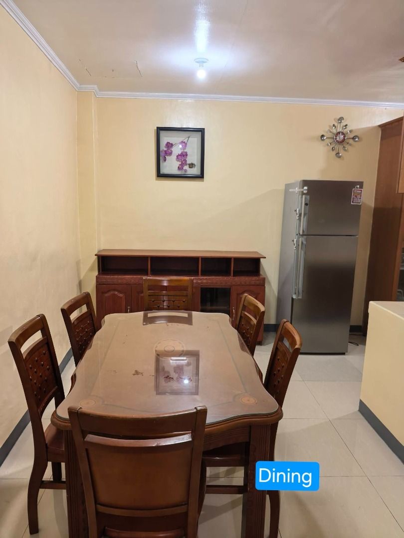 House for Rent (Category: House & Lot) located in Pasig City. Submitted by dzeims (Listing ID 1467880136, Image 3). Description: House available for rent, featuring multiple rooms with beds and air conditioning units. Includes bathrooms with tiled walls, sinks, and toilets. Outside features a secured front gate with stone detailing and house number 9. Tiled flooring throughout the interior rooms and bathrooms. Unit Details: - 130 sqm - Fully furn