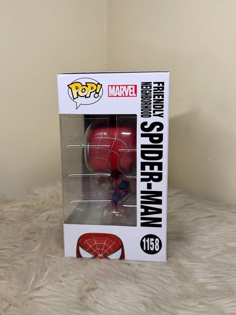Funko Pop Marvel Spider-Man No Way Home 1158 (Category: Designer & Blind Box Toys) located in Manila. Submitted by shoptoji (Listing ID 1467978371, Image 3). Description: -BIB, nadetach yung stand from the figure pero can be glued kayo nalang mag glue -9.5/10 box condition - with free boss protector - Item: Friendly Neighborhood Spider-Man Bobble-Head (#1158) - Universe: Spider-Man: No Way Home (Marvel Series) - Condition: Brand new in original w