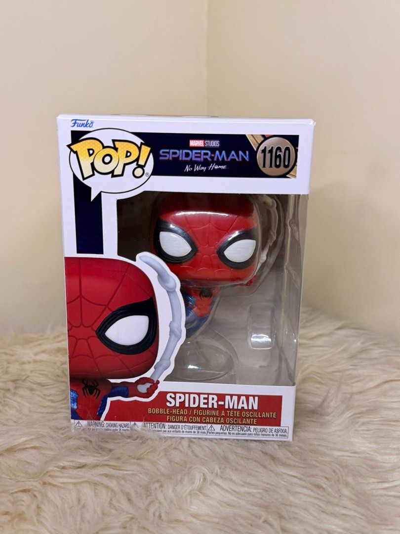 Funko Pop Marvel Spider-Man No Way Home 1160 (Category: Designer & Blind Box Toys) located in Manila. Submitted by shoptoji (Listing ID 1467979015, Image 1). Description: -BIB nilabas lang once -with free box protector - Funko Pop! Marvel Studios: Spider-Man: No Way Home (#1160) - Dynamic action pose featuring web effects - Includes original packaging with clear plastic display window - Official Marvel merchandise - Condition: Brand new in box / 