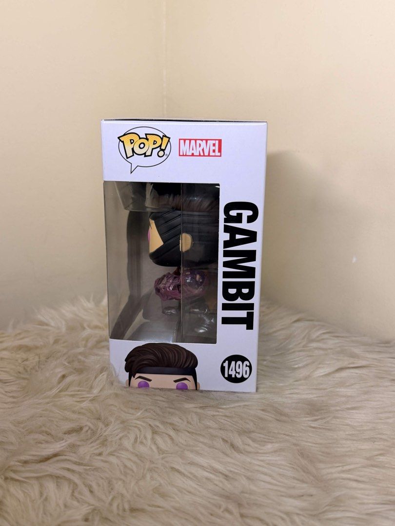 Funko Pop Marvel Studios Deadpool & Wolverine Avengers Doomsday Gambit 1496 (Category: Figurines & Statues) located in Manila. Submitted by shoptoji (Listing ID 1467978875, Image 3). Description: -BIB nilabas lang once -with free box protector Funko Pop vinyl figure of Gambit from Deadpool and Wolverine. Number 1496 in the Marvel series. Box shows the character holding glowing pink kinetic cards. Window box packaging in clean shape, corners look 