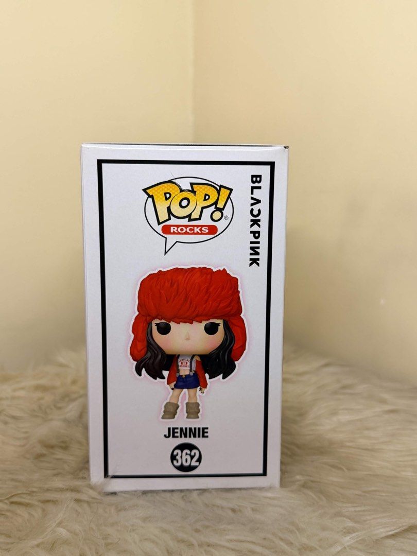 Funko Pop Rocks BLACKPINK Jennie #362 Shut Down (Category: Designer & Blind Box Toys) located in Manila. Submitted by shoptoji (Listing ID 1467977792, Image 3). Description: -MISB with free boss protector - Item: BLACKPINK Jennie Funko Pop #362 (Shut Down Era) - Outfit: Red ushanka hat, denim skirt, and boots - Condition: Great box shape with clear window display - Authenticity: Official YG sticker on the front - Size: Stands approx. 4 inches tal