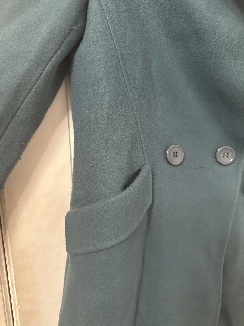 Furuixuan Blue Double Breasted Wool Blend Coat Size M (Category: Coats, Jackets and Outerwear) located in Quezon City. Submitted by jambalaya (Listing ID 1467975987, Image 2). Description: - Brand: Furuixuan -teal color - Size: Medium (M) - Style: Double-breasted winter coat with lapel collar and solid back center seam - Features: Functional front pockets and front button closure - Material: 3% wool, 60% acrylic, 37% polyester blend - Care Instru