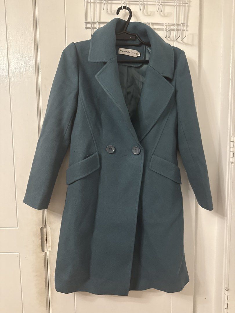 Furuixuan Blue Double Breasted Wool Blend Coat Size M (Category: Coats, Jackets and Outerwear) located in Quezon City. Submitted by jambalaya (Listing ID 1467975987, Image 1). Description: - Brand: Furuixuan -teal color - Size: Medium (M) - Style: Double-breasted winter coat with lapel collar and solid back center seam - Features: Functional front pockets and front button closure - Material: 3% wool, 60% acrylic, 37% polyester blend - Care Instru