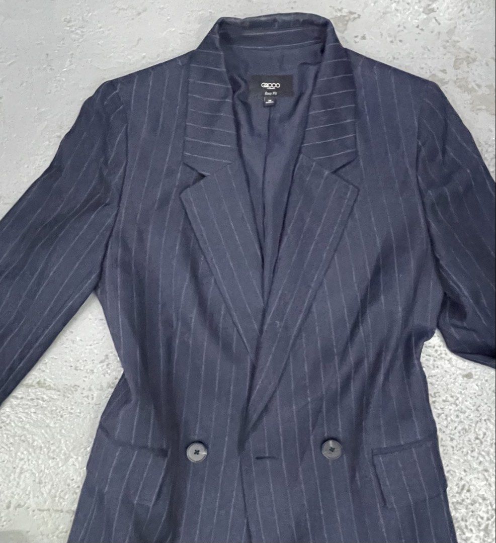 G2000 Navy Blue Pinstripe Double-Breasted Blazer Jacket (Category: Coats, Jackets and Outerwear) located in Bulacan. Submitted by grazcloset (Listing ID 1467890006, Image 2). Description: - Brand: G2000 - Color & Pattern: Navy blue with subtle grey pinstripes - Style: Double-breasted front with dark matching buttons - Features: Lapel collar, front flap pockets, and structured shoulders - Sleeves: Full-length with three buttons on each cuff - Inte