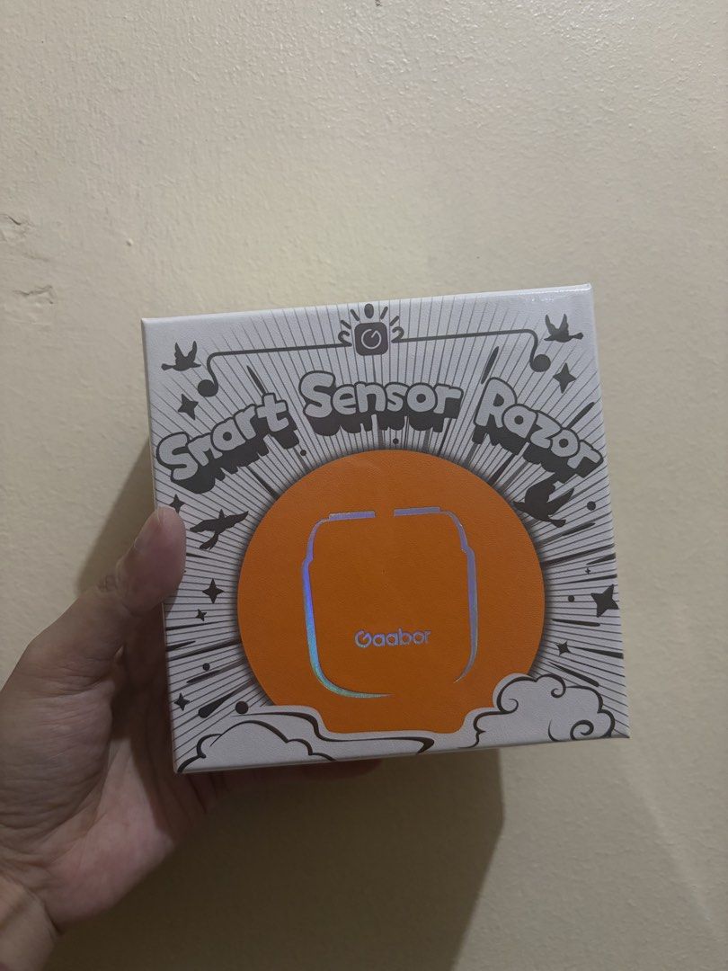 Gaabor Smart Sensor Razor ER-T01B Electric Shaver (Category: Men's Grooming) located in Valenzuela. Submitted by rhen0901 (Listing ID 1467859975, Image 1). Description: - Brand: Gaabor Smart Sensor Razor - Model: ER-T01B - Color: Orange - Power: 5W (3.7V) - Weight: 0.10kg net (0.24kg gross) - Box Size: 135x135x45mm - Condition: Brand new, sealed, and unopened in original packaging.