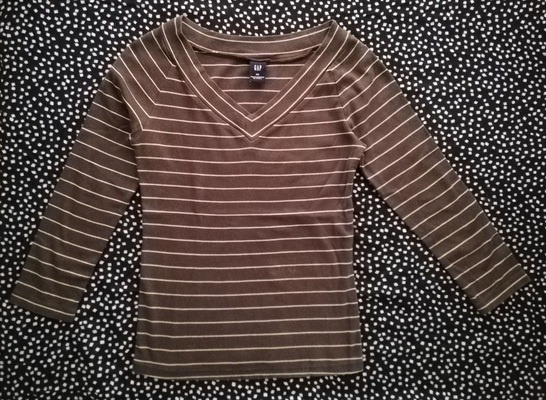 Gap V-Neck Striped T-Shirts Bundle (Category: Shirts) located in Makati City. Submitted by bananafishph (Listing ID 1468050950, Image 2). Description: - Brand: Gap - Bundle of 2 V-neck top for P450 +SF (shouldered by buyer) - Colors: Brown and salmon - Size: XS - Sleeves: 3/4 sleeve - Material: Cotton - Personally owned by seller and not from ukay. __________________________________________________ MOP: BPI & Gcash/ No COD.