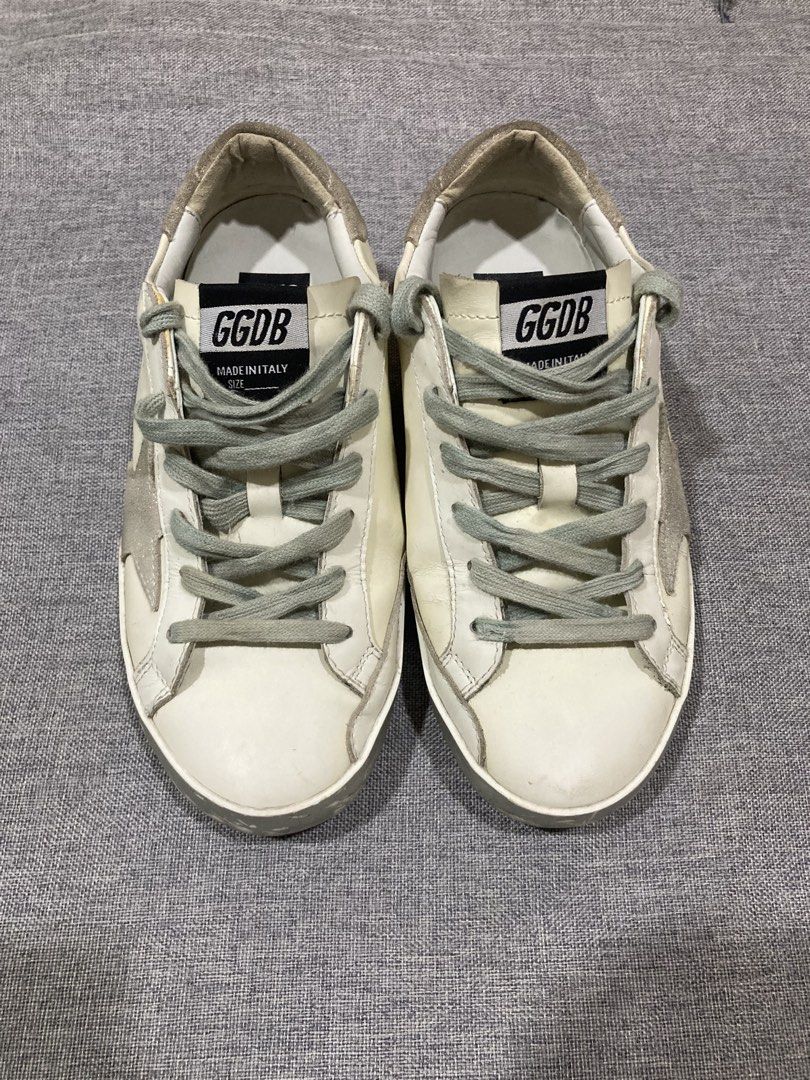 GGDB Super Star White Double Silver (Category: Sneakers) located in Zamboanga. Submitted by deensthrifting (Listing ID 1467993711, Image 1). Description: GGDB SUPER STAR WHITE DOUBLE SILVER SIZE 37 Very good condition Issue: dikitan .