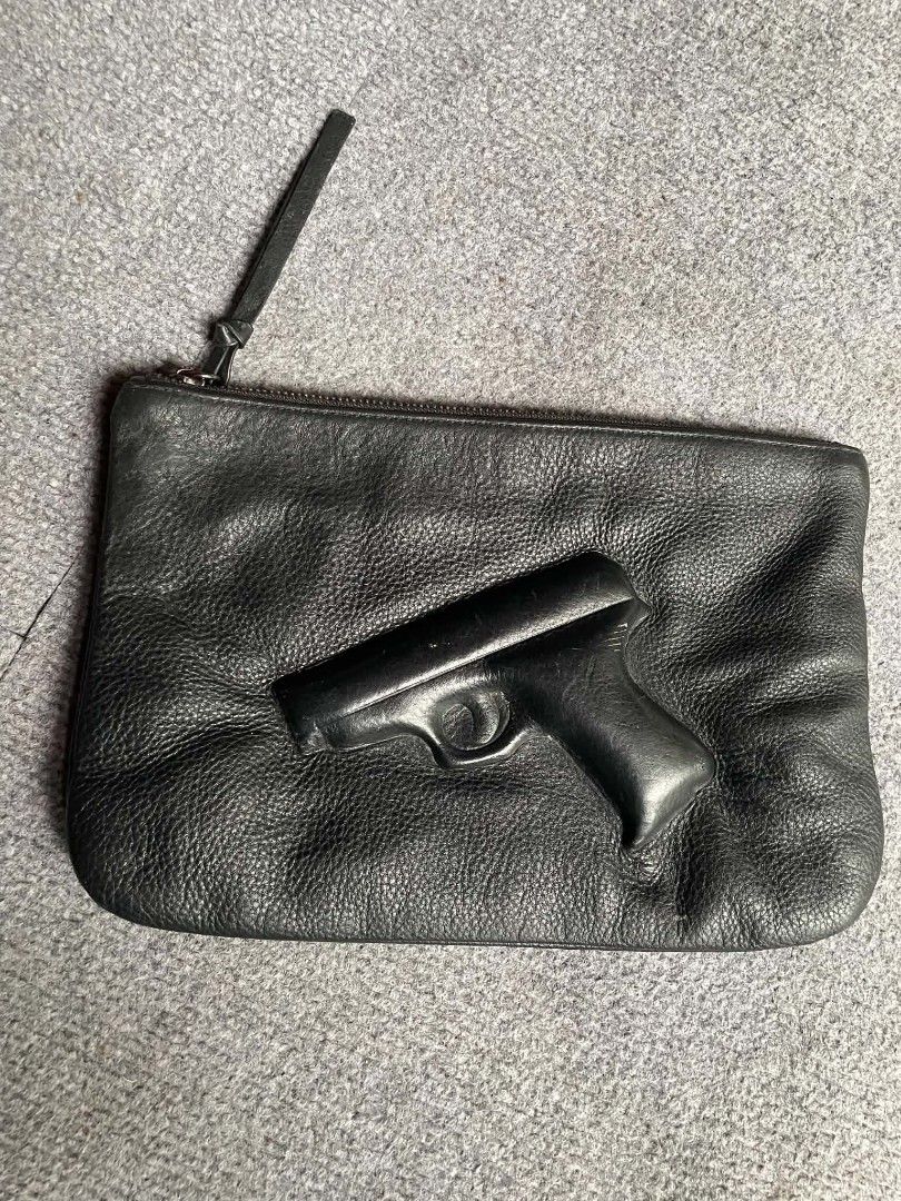 GIVENCHY CLUTCH BAG (Category: Luxury Bags & Wallets) located in Tacloban City. Submitted by solothriftfinds (Listing ID 1467906775, Image 1). Description: GIVENCHY CLUTCH BAG VERYGOOD CONDITION ISSUE:SMALL DENTS.