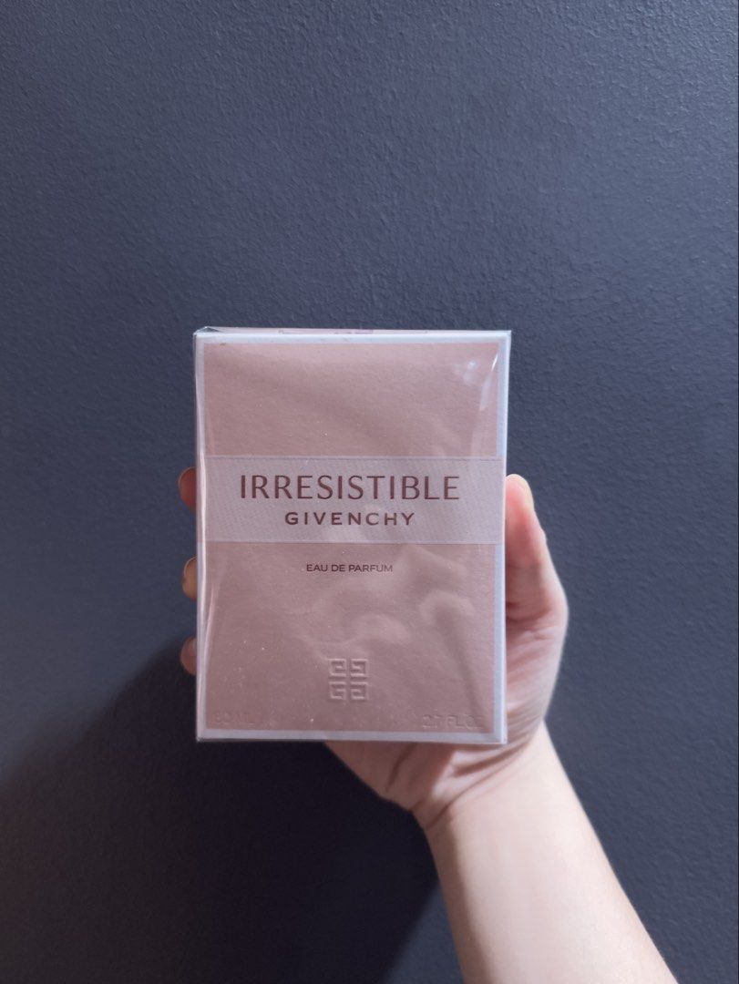 Givenchy Irresistible Eau De Parfum 80ml (Category: Fragrance & Deodorants) located in Manila. Submitted by gloryhetold (Listing ID 1467995495, Image 1). Description: MALL PRICE: ₱10,650 OUR PRICE: ₱7,000 - Authentic Givenchy Irresistible Eau de Parfum - Generous 80ml bottle size - 100% brand new, unopened, and sealed in original cellophane - Fresh box featuring clear barcode and batch code at the bottom - Delightful and classic floral-fruity sce