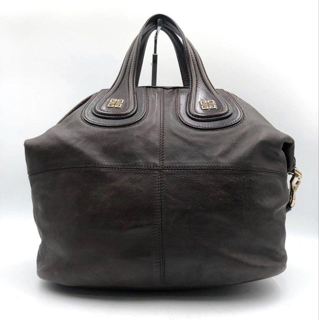 Givenchy Medium Nightingale Dark Brown (Category: Shoulder Bags) located in Las Pinas. Submitted by daisuki_japan_luxury_by_reiko (Listing ID 1468055417, Image 3). Description: ■ Brand: Givenchy ■ Size: Height approx. 31cm x Width approx. 50cm x Depth approx. 18cm, Handle approx. 30cm *Please note that these are amateur measurements taken with a hand-held tape measure, so some errors may occur. ■ Color: Dark Brown ■ Material: Leather ■ Accessorie