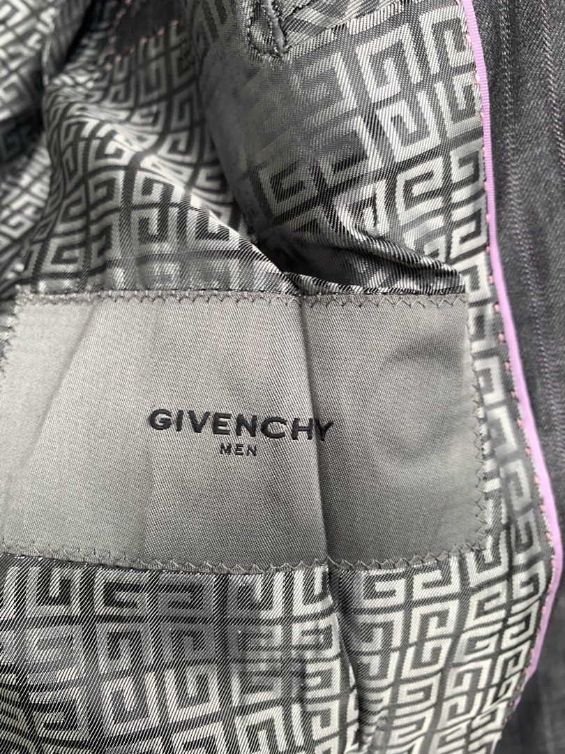Givenchy Men Pinstripe Blazer Grey Size 39S (Category: Coats, Jackets and Outerwear) located in Manila. Submitted by jeffreyluz31198 (Listing ID 1467926594, Image 3). Description: - Brand: Givenchy - Color: Dark grey with subtle pinstripes - Size: 39S - Features: Double-breasted front, notched lapels, flap pockets, and a striking signature logo-patterned lining - Origin: Made in Korea - Condition: Good, but currently wrinkled from storage and nee