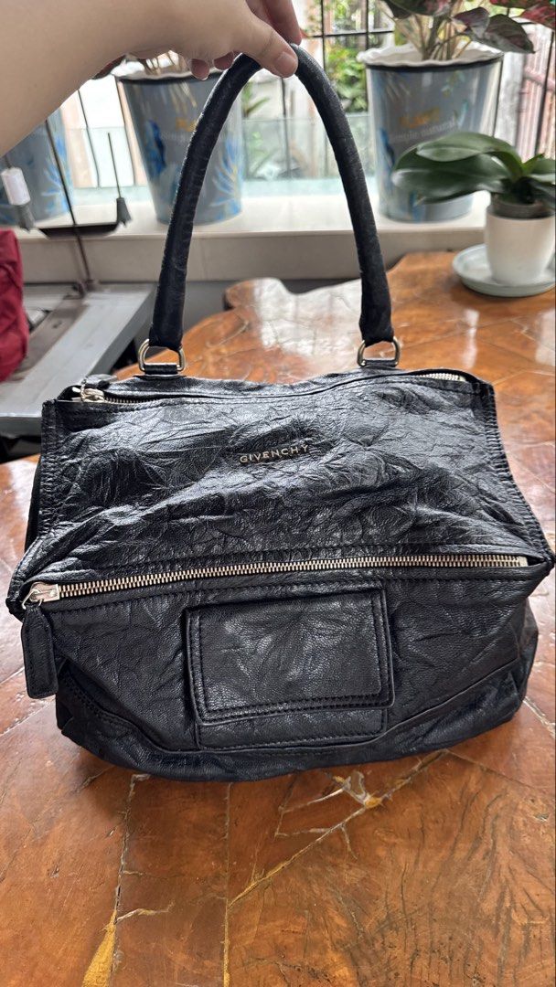 Givenchy Pandora (Category: Luxury Bags & Wallets) located in Tagbilaran City. Submitted by Bunnybebu (Listing ID 1467921711, Image 1). Description: Excellent condition Made in Italy Coded No flaws /gasgas / butas Medium size Super light MISSING SLING Kindly inspect all photos carefully for details. Zoom in you must. 📍Tagbilaran City, Bohol ⚠️ This is a thrifted item so please manage your expectations. ❎ Bawal sa maselan at maarte ‼️All sales ar