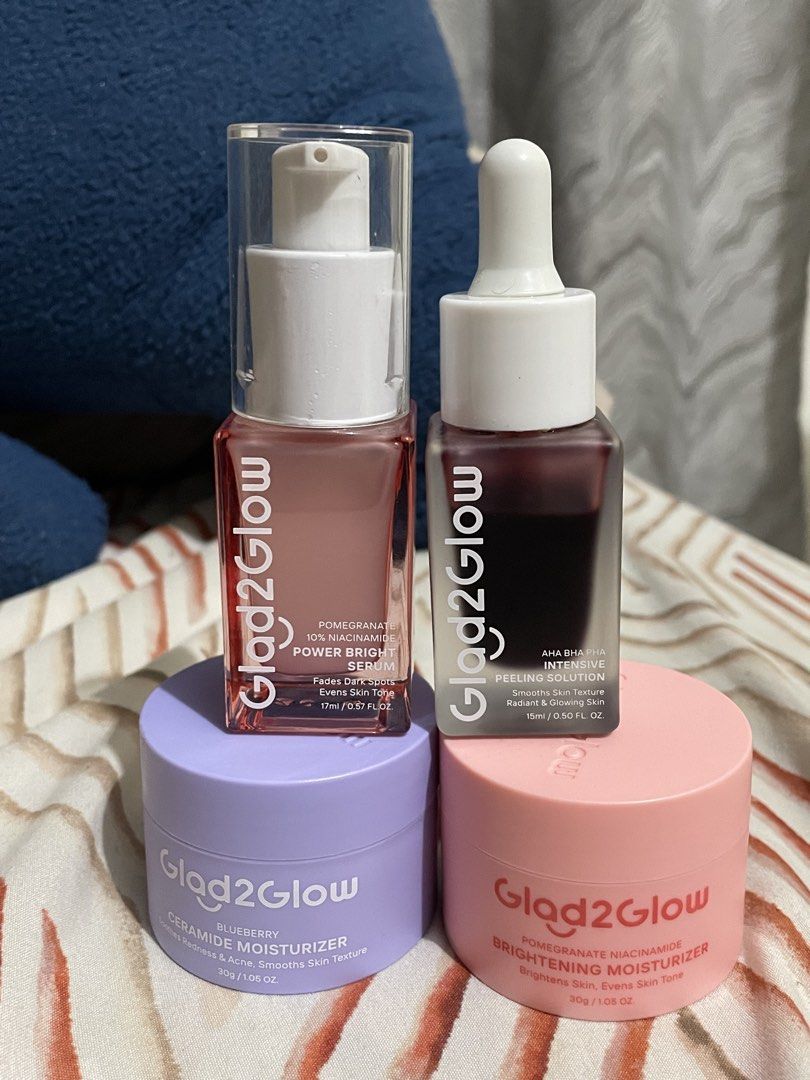 Glad2Glow Skincare Bundle Serum and Moisturizer Set (Category: Face Care) located in Manila. Submitted by hope2007 (Listing ID 1467998905, Image 2). Description: Glad2Glow skincare collection including Pomegranate Power Bright Serum, AHA BHA PHA Peeling Solution, Blueberry Ceramide Moisturizer, and Pomegranate Niacinamide Brightening Moisturizer. Full set of four bottles and jars. Great daily routine for glowing skin..