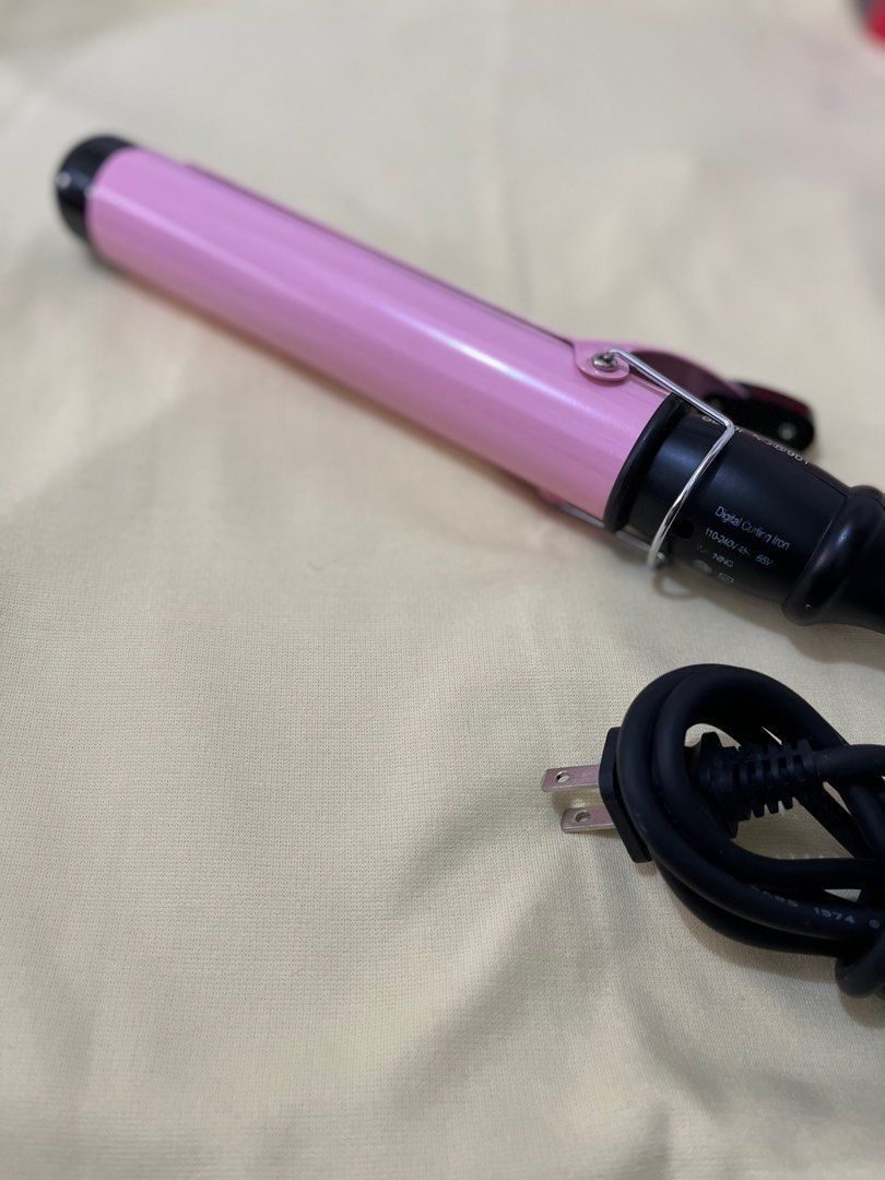 Gladking Pink 38mm Curling Iron (Category: Hair) located in Caloocan City. Submitted by notmichaela (Listing ID 1467905232, Image 2). Description: Please check last photo for technical info. Flaws: may small black marks sa mismong iron nadikit siguro while it’s still hot but does not affect naman its purpose and also fading labels lang. No box na din. Used not more than 5 times, natambak lang talaga so expect dust sa mga malalim na parts. RFS: Hi