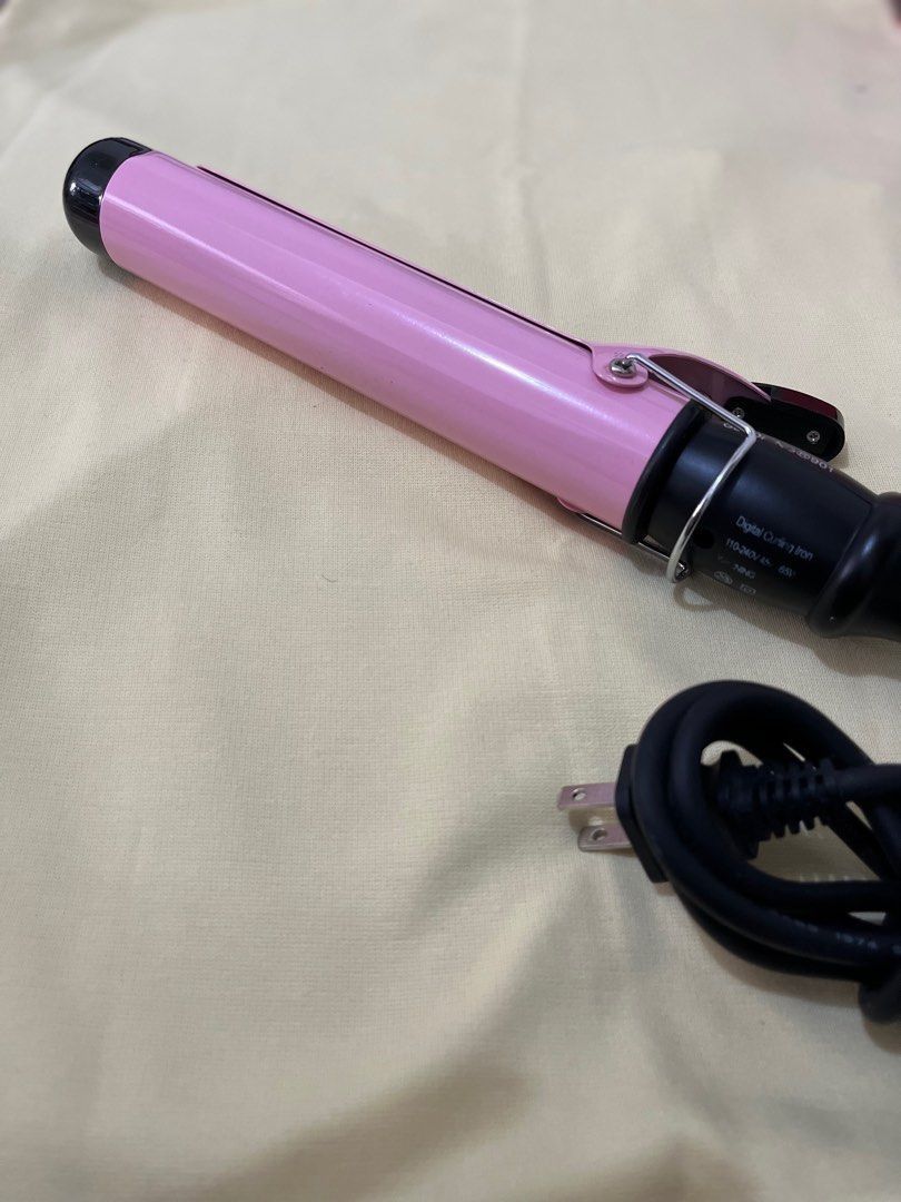 Gladking Pink 38mm Curling Iron (Category: Hair) located in Caloocan City. Submitted by notmichaela (Listing ID 1467905232, Image 3). Description: Please check last photo for technical info. Flaws: may small black marks sa mismong iron nadikit siguro while it’s still hot but does not affect naman its purpose and also fading labels lang. No box na din. Used not more than 5 times, natambak lang talaga so expect dust sa mga malalim na parts. RFS: Hi