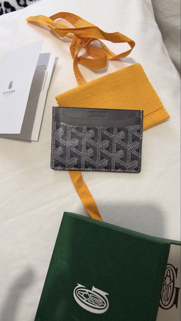 Goyard Saint Sulpice (Category: Luxury Bags & Wallets) located in Makati City. Submitted by pao0119 (Listing ID 1467902844, Image 3). Description: Selling my Goyard Saint Sulpice Card holder Bought in EU Complete with box, ribbon Gray in color Used only for couple of times No issues. In pristine condition Selling it for 20k slight neg.