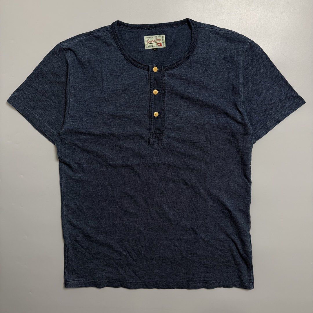Graph Zero Raw Indigo Henley Tee Made in Japan (Category: Tshirts & Polo Shirts ) located in Cebu City. Submitted by inukaybyjlf (Listing ID 1468057871, Image 1). Description: Condition: Good as new Issue: No flaws Dimensions: 19.5x26.5 Best fit: M-L Please refer to photos for actual condition.