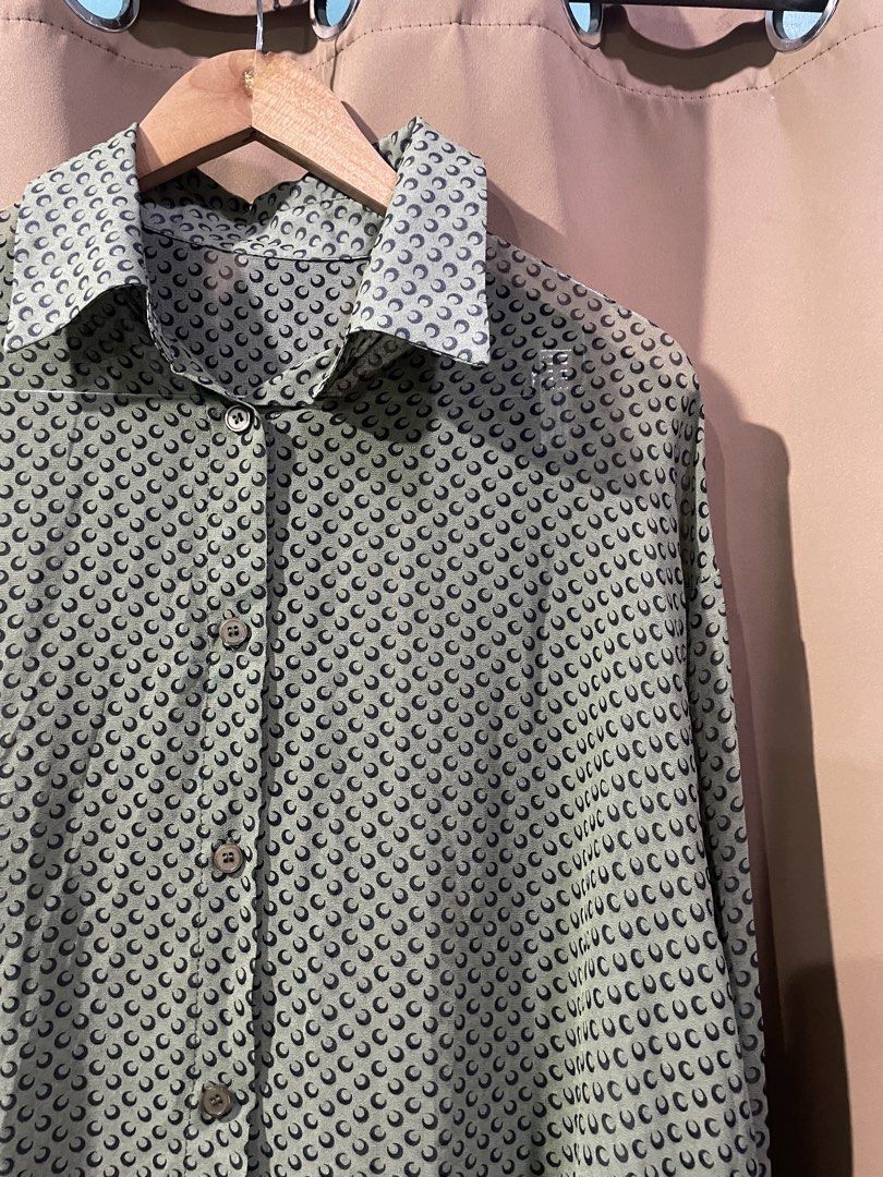Green Crescent Moon Print Button-Up Blouse Size Large (Category: Blouses) located in Quezon City. Submitted by smileclothingline (Listing ID 1467857517, Image 2). Description: 🚚Courier: J&T/Lalamove/Gogoexpress 📍Shipping fee depends on your location 💸Mode of Payment: BPI/Gcash/Paymaya ‼️Payment first, only then will ship the item.