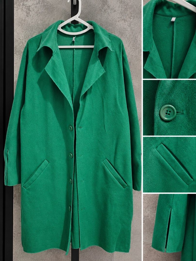 Green Trench Coat (Category: Coats, Jackets and Outerwear) located in Taguig. Submitted by roniquefinds (Listing ID 1467861836, Image 1). Description: - Color: Vibrant green - Style: Mid-length coat with structured shoulders and wide lapels - Closure: Front button closure - Pockets: Two functional slanted front pockets - Sleeves: Long sleeves with chic small slits at the cuffs - Condition: Great find, ready to wear.